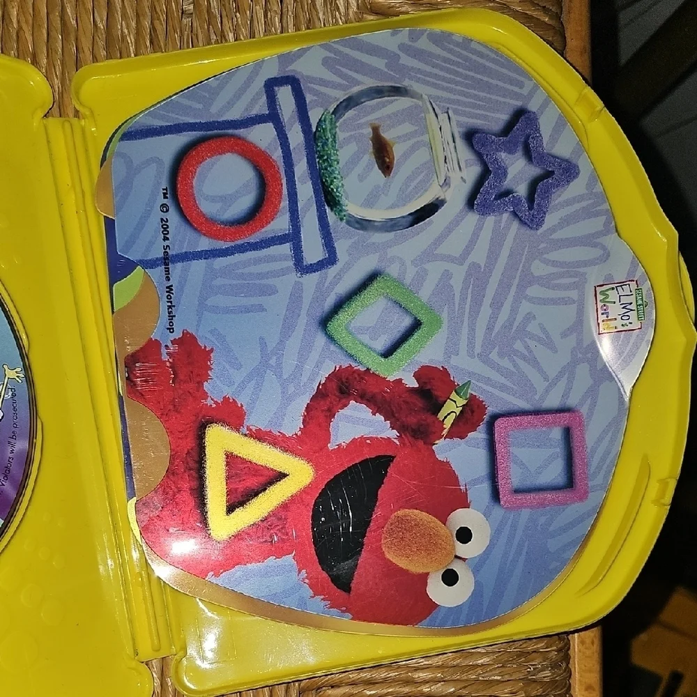 Fisher-Price InteracTV DVD with Dora, SpongeBob and Elmo And Yellow Case